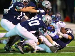 Traumatic Brain Injury News Reports and Participation in High School Tackle Football